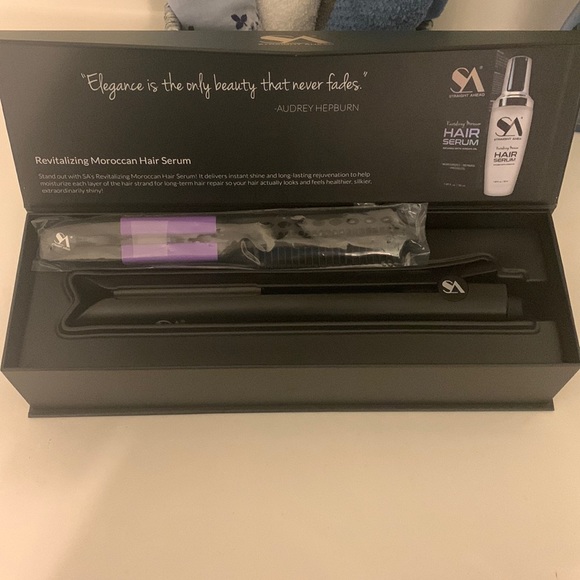 Straight Ahead straightener plus easy comb. Black iron and...